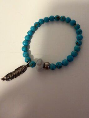 Beaded Bracelet with feather charm